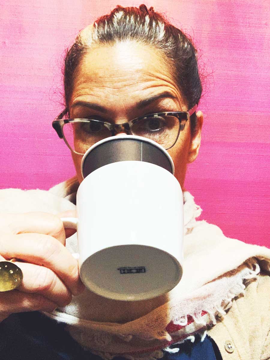 leah dibernado drinking coffee